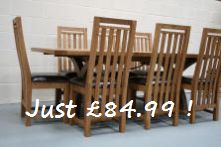 Solid American oak chairs with leather pads just �84.99