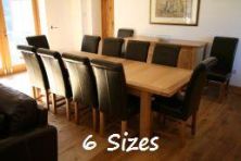 6 sizes of Tallinn table to choose from.  2.4 - 2.9m Tallinn with luxury Titan leather chairs @ £99.99 each shown here